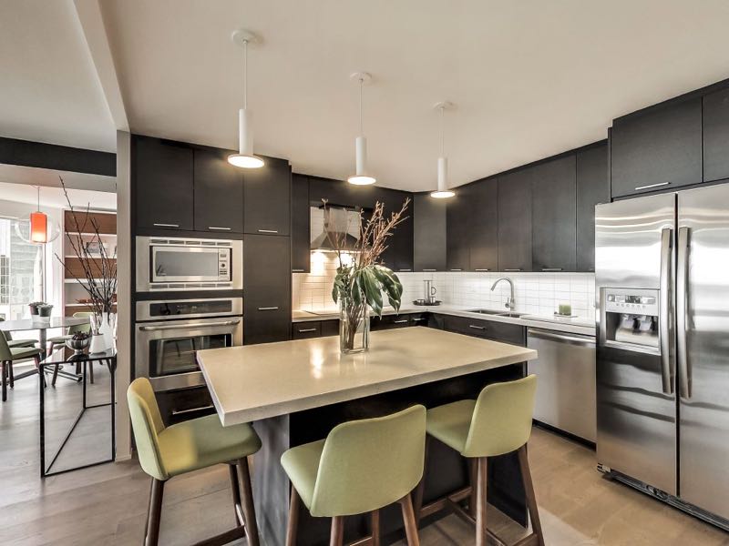 401 Queens Quay W 502 kitchen island with pendant lighting makes for a great eating area and work space