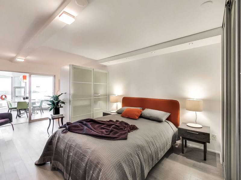 401 queens quay w 502 master bedroom has modern lighting and good storage
