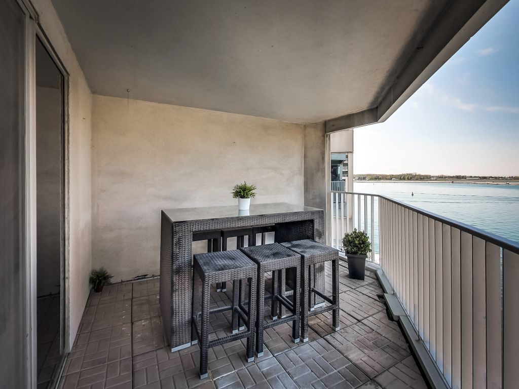 401 Queens Quay W 503 has a large open balcony right on the water